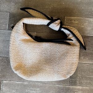 Chic Tan boho Bag with Black Accents can add a strap for a cross body look